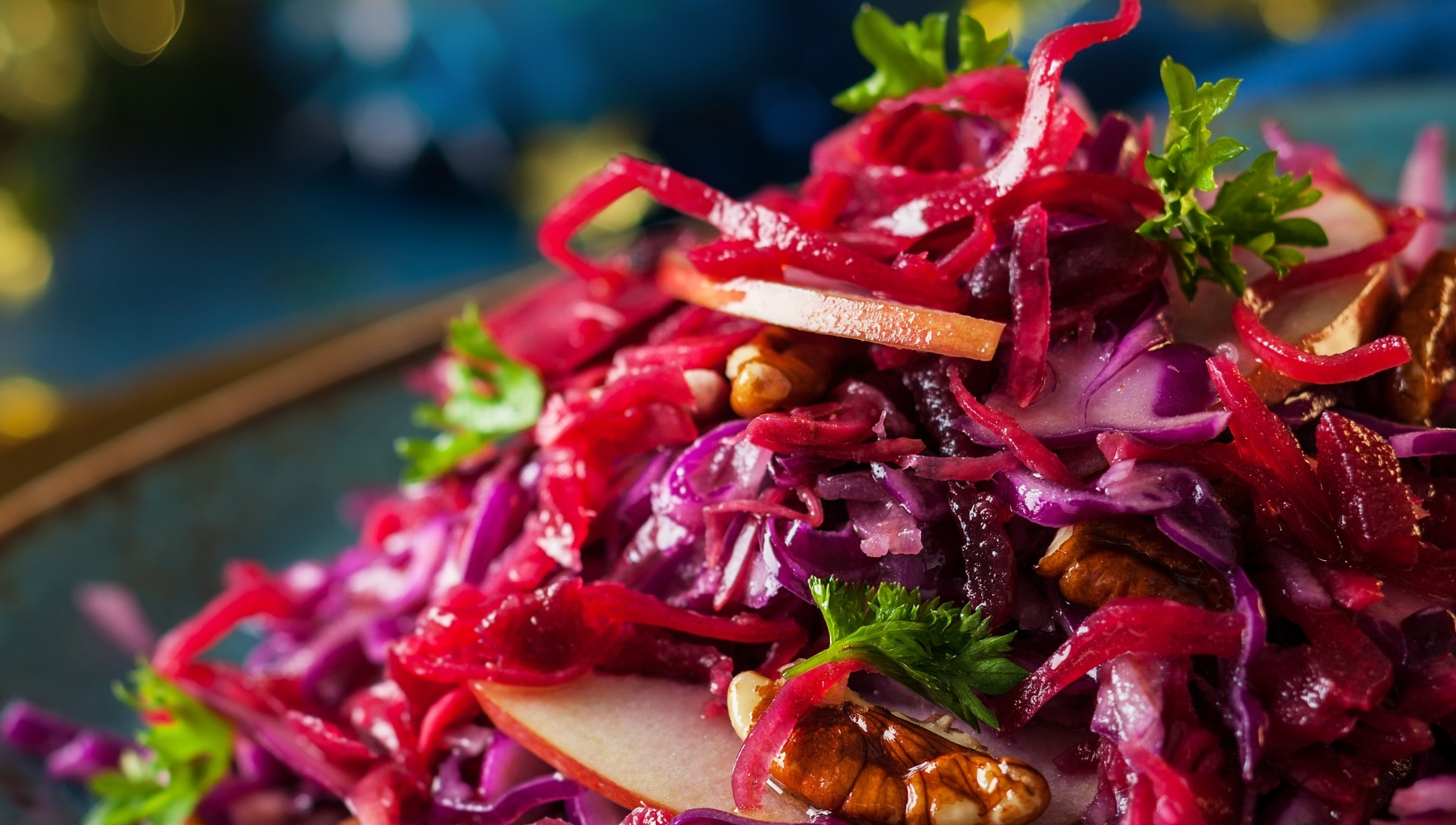 Asian-inspired salad with walnuts, apple and red cabbage with Spiralz Ginger Tummy Tonic.